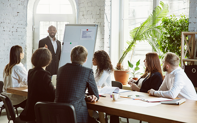 Large business group gathering to discuss business matters